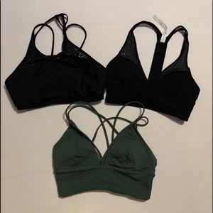 Three Lululemon sports bras